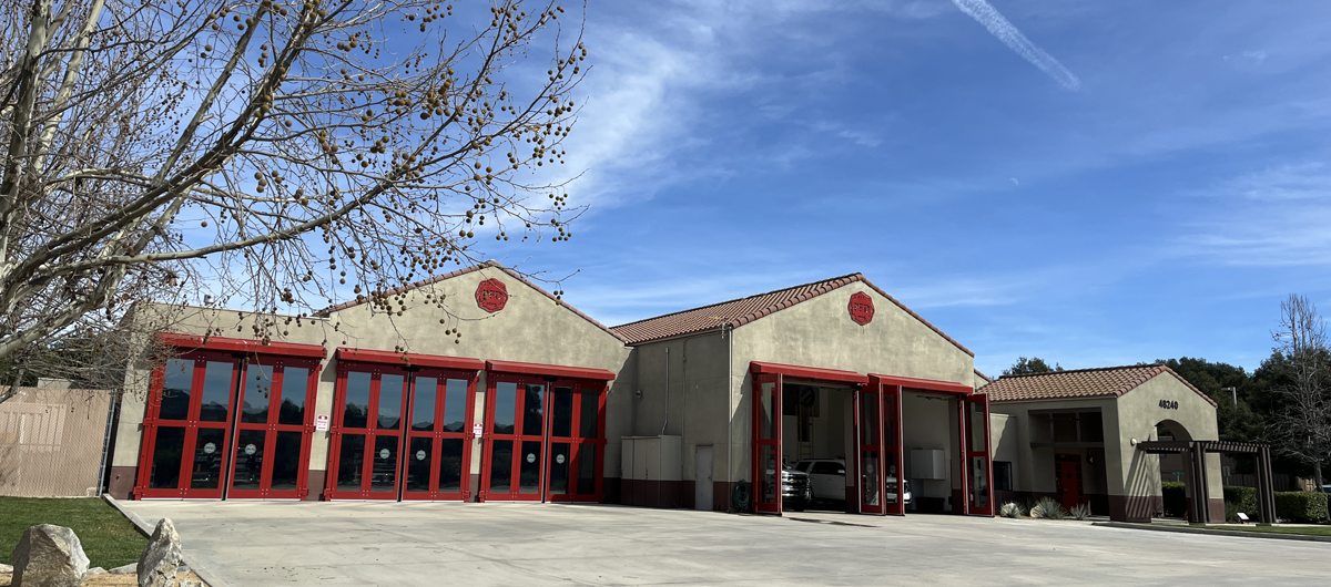Pechanga Fire Station with red bay doors under a clear blue sky